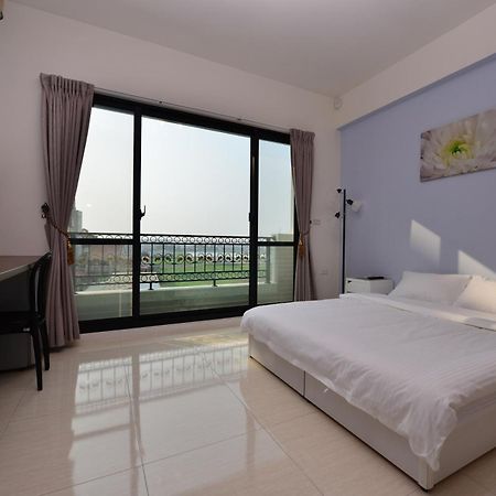 Stsp Guest House Xinshi Bagian luar foto